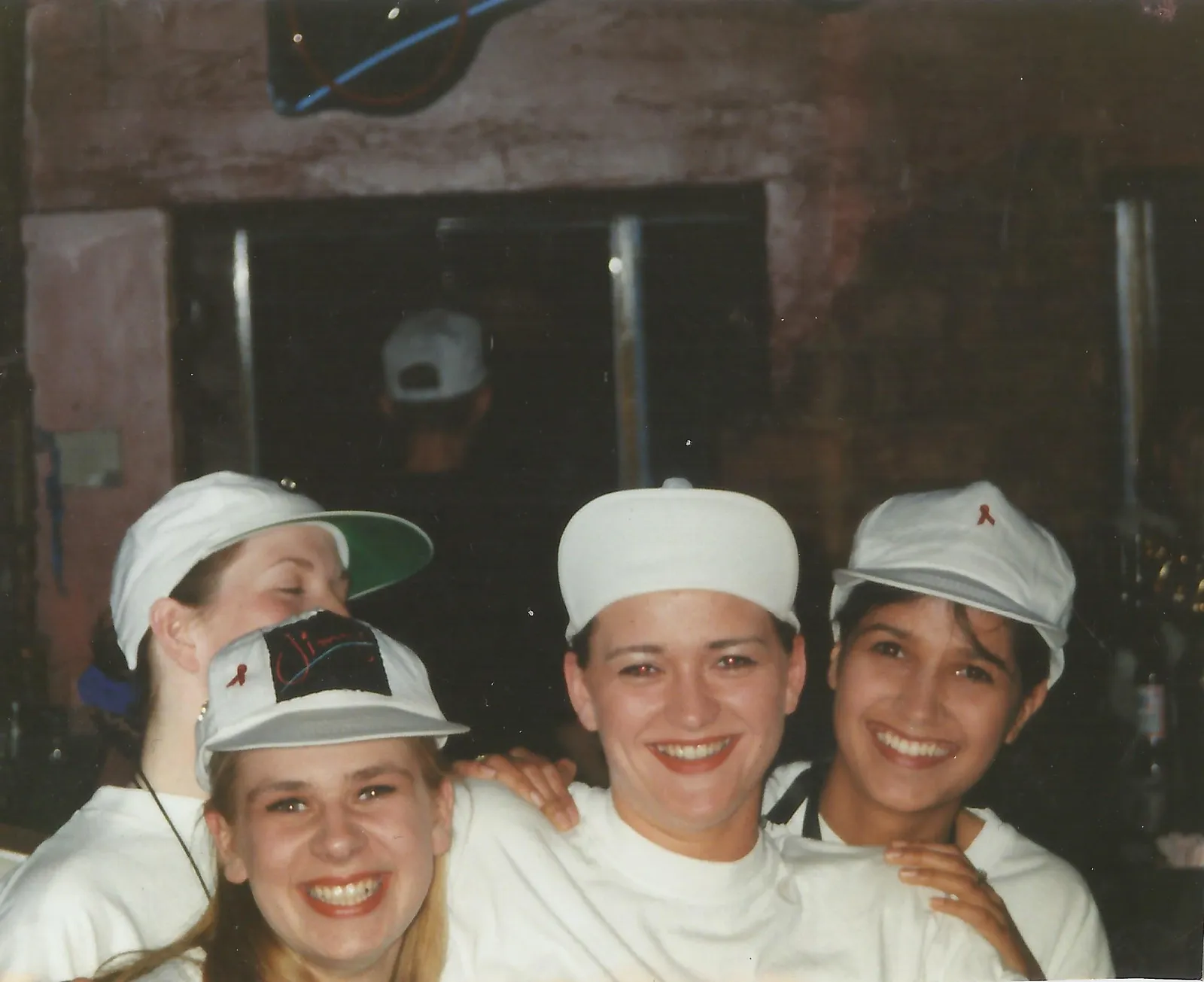 Jimmy's bar staff in branded caps